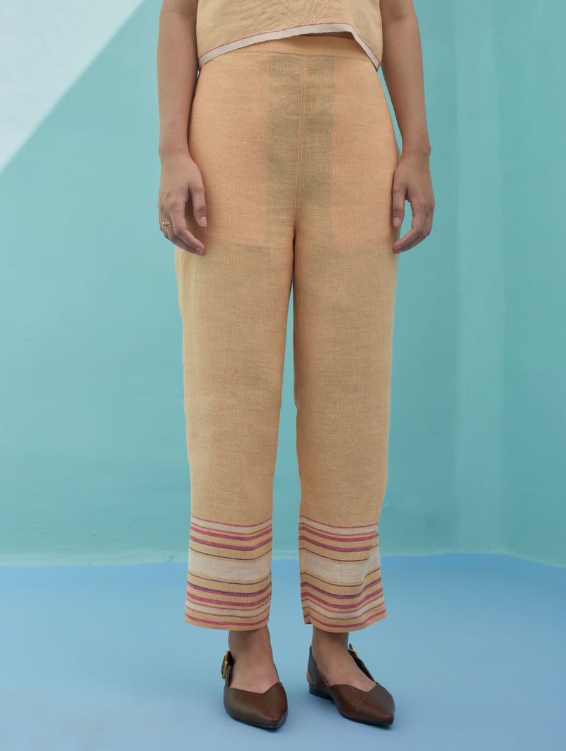 Ines Border Linen Tapered Pants - Apricot linen pant/trouser by Manan in apricot for women Worldwide