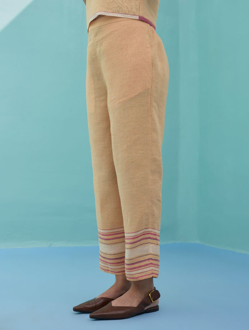 Ines Border Linen Tapered Pants - Apricot linen pant/trouser by Manan in apricot for women Worldwide