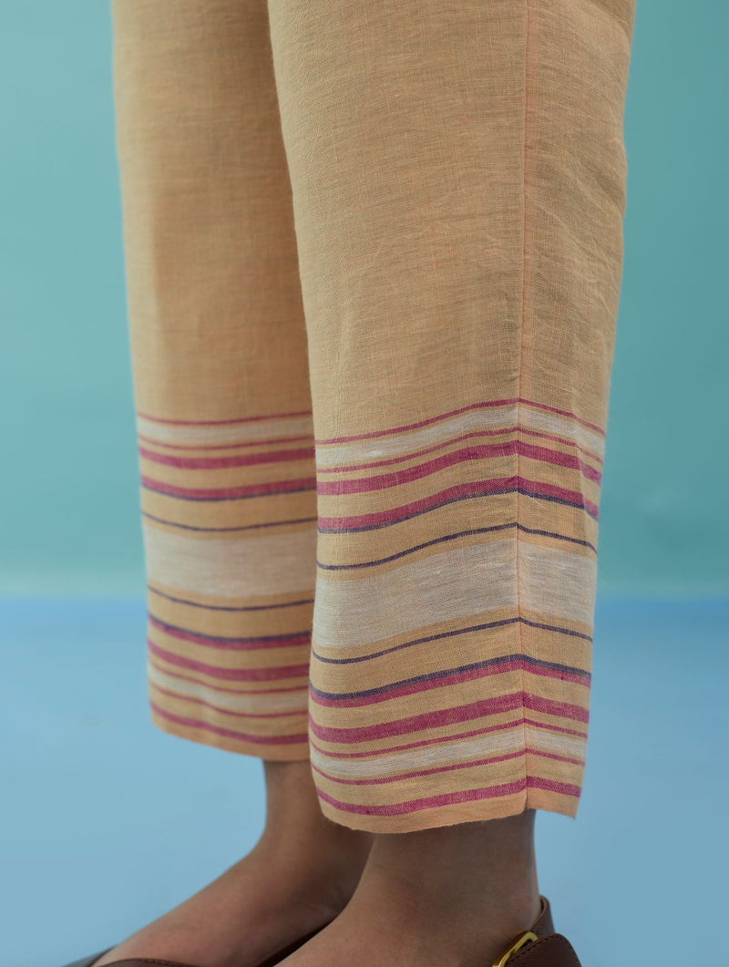 Ines Border Linen Tapered Pants - Apricot linen pant/trouser by Manan in apricot for women Worldwide