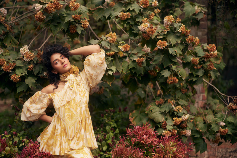Aveza Peplum Set-Yellow chanderi by Paulmi & Harsh in golden yellow for women Worldwide