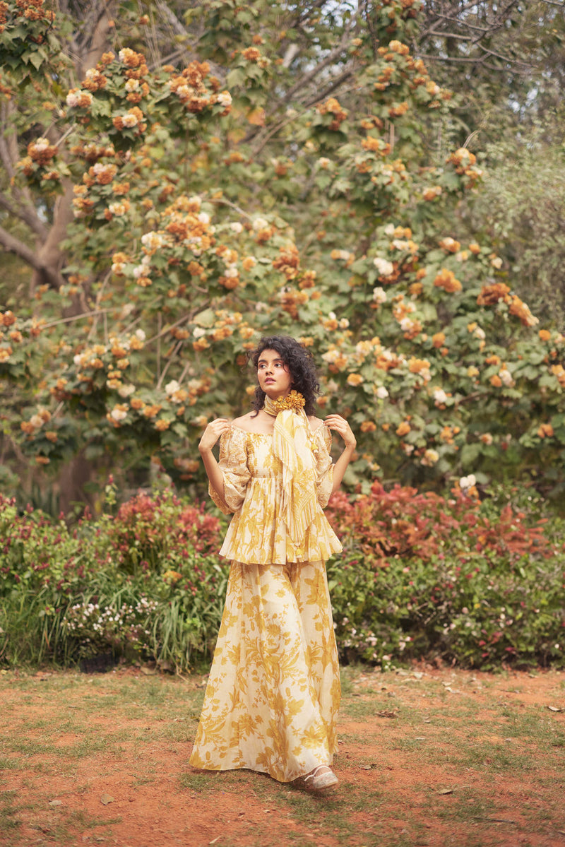 Aveza Peplum Set-Yellow chanderi by Paulmi & Harsh in golden yellow for women Worldwide