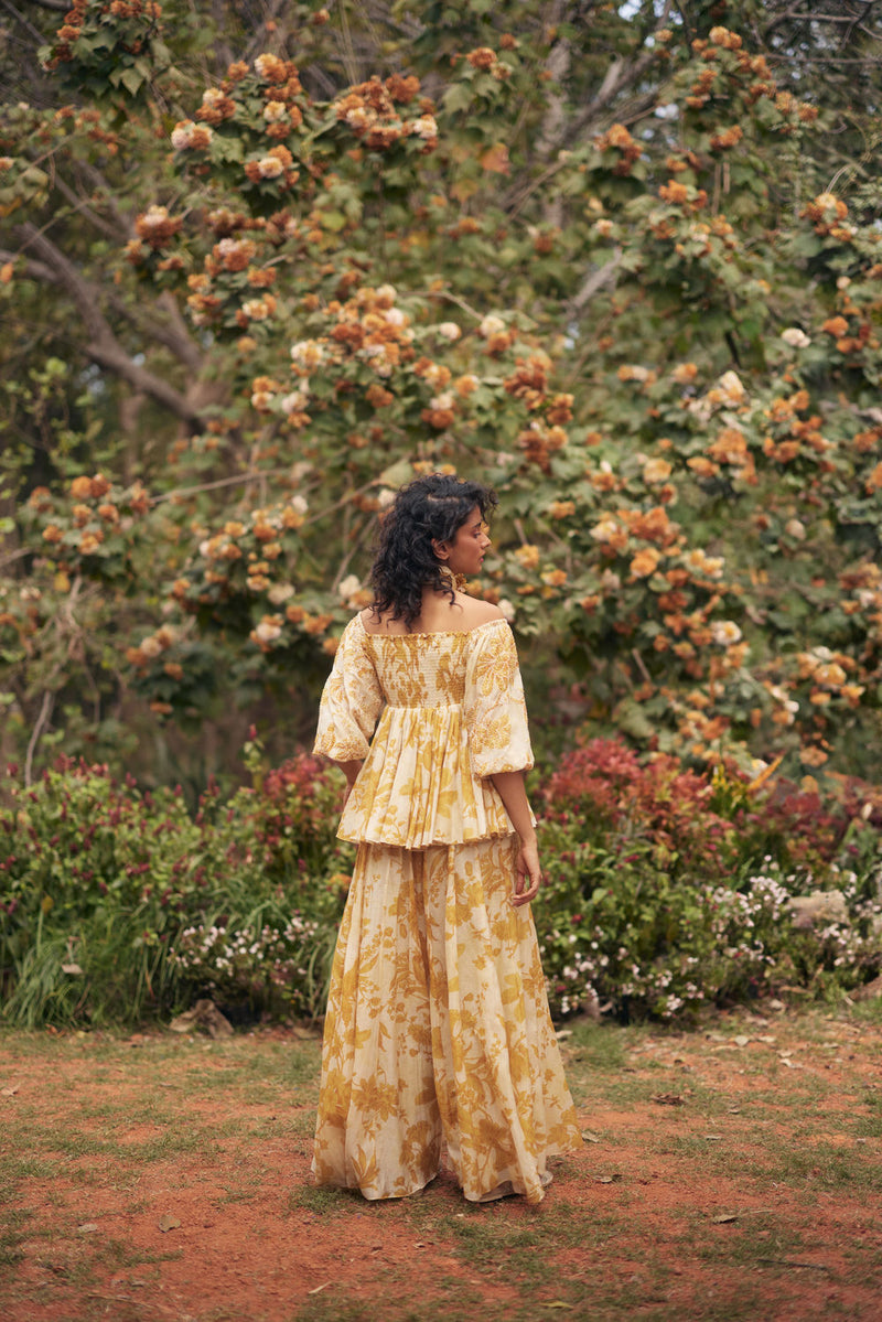 Aveza Peplum Set-Yellow chanderi by Paulmi & Harsh in golden yellow for women Worldwide