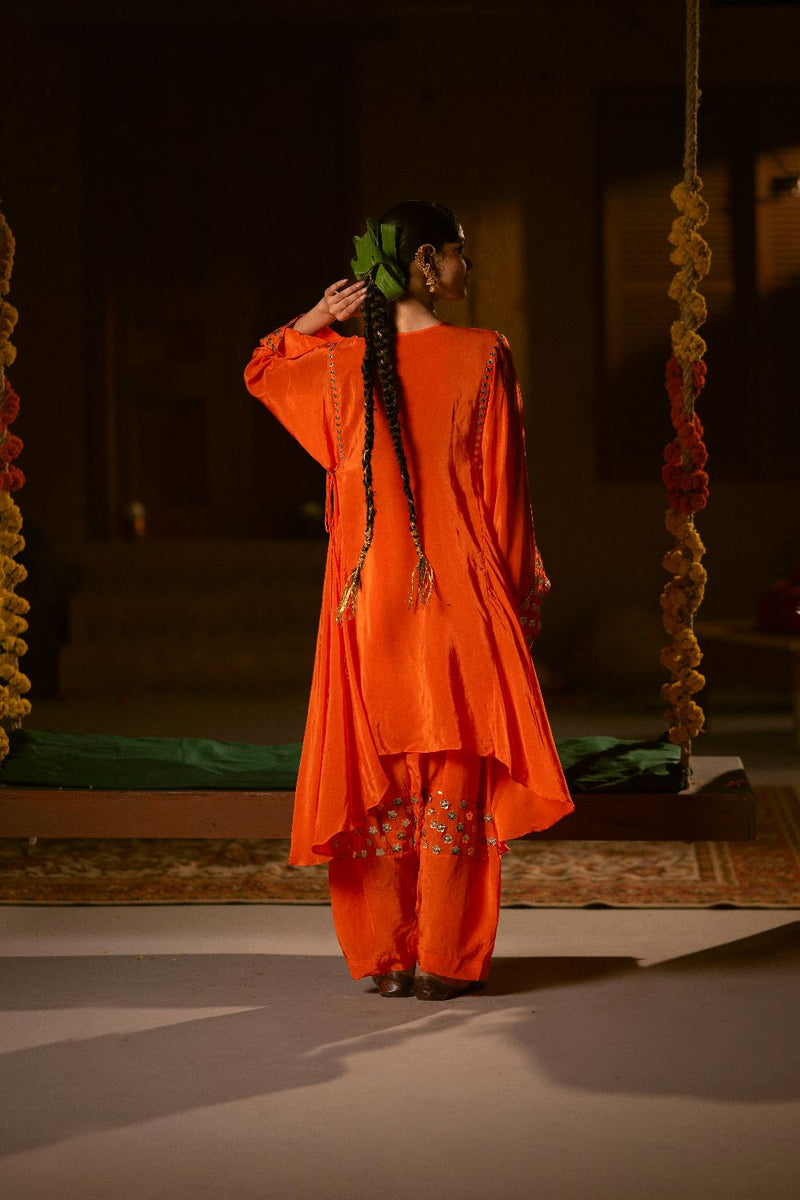 Mangala Asymmetrical Choga with Salwar- Orange silk by PRAHNAAYA in orange color for women Worldwide