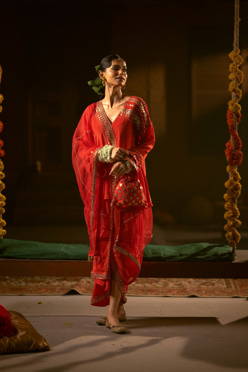 Ramani Tunic Jacket with Pleated Skirt & Dupatta- Red silk by PRAHNAAYA in red color for women Worldwide