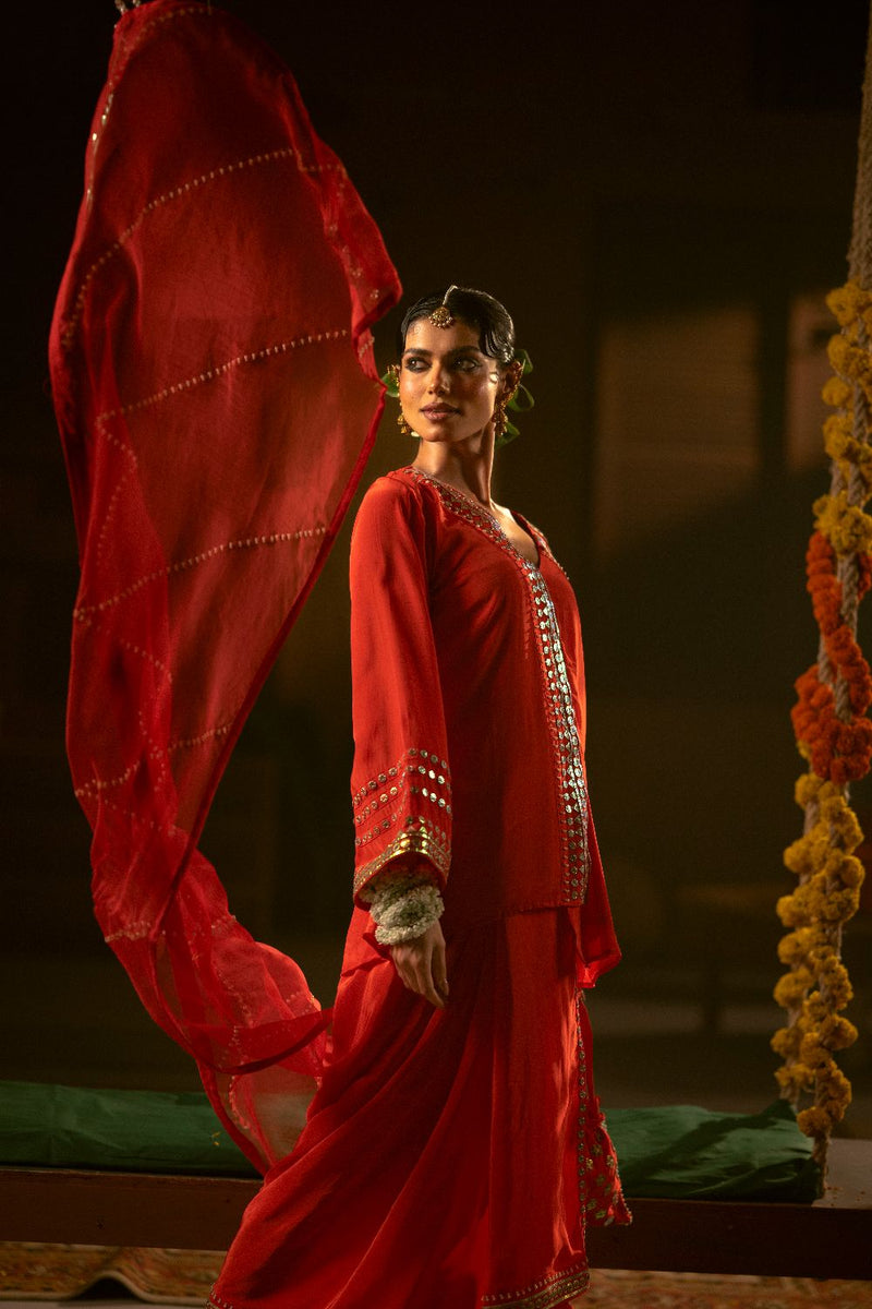 Ramani Tunic Jacket with Pleated Skirt & Dupatta- Red silk by PRAHNAAYA in red color for women Worldwide