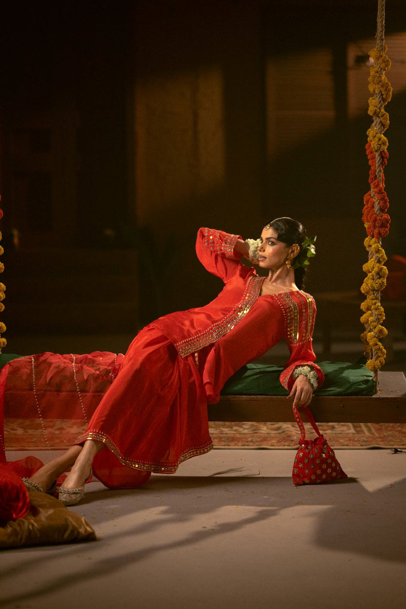 Ramani Tunic Jacket with Pleated Skirt & Dupatta- Red silk by PRAHNAAYA in red color for women Worldwide