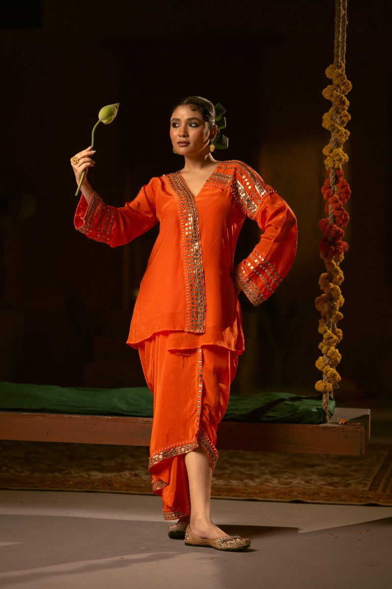 Mangala Tunic Jacket with pleated skirt- Orange silk by PRAHNAAYA in orange color for women Worldwide