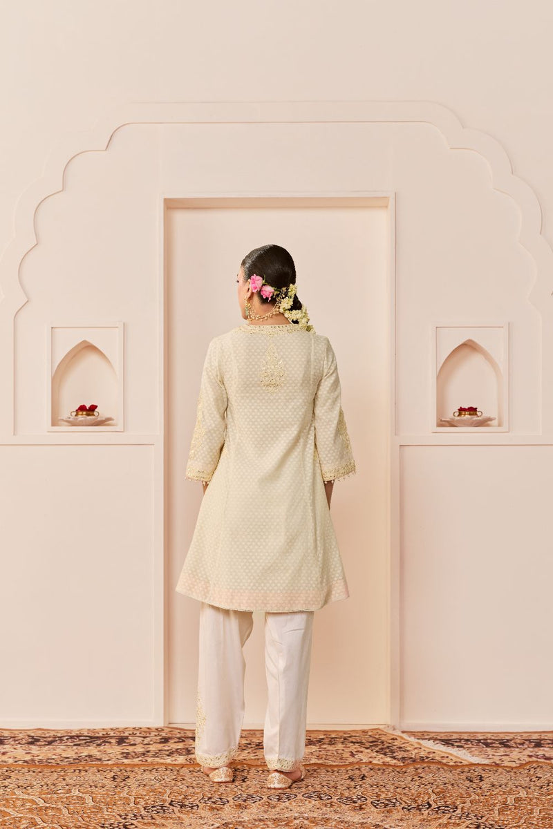 REEM - DAISY IVORY SHORT CHOGA WITH DOGRI SALWAR chanderi silk kurta/kurta set by SHEETAL BATRA in daisy iovry with carnation pink for women Worldwide