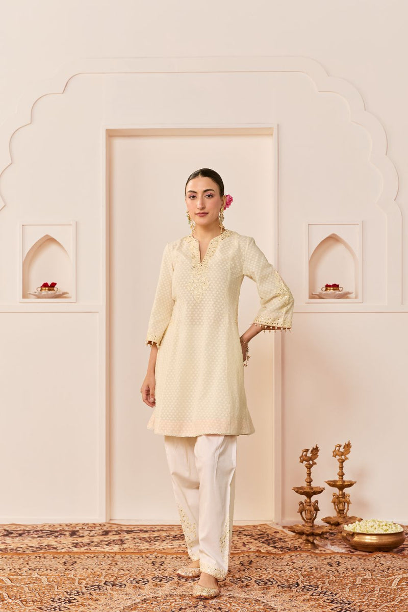 REEM - DAISY IVORY SHORT CHOGA WITH DOGRI SALWAR chanderi silk kurta/kurta set by SHEETAL BATRA in daisy iovry with carnation pink for women Worldwide