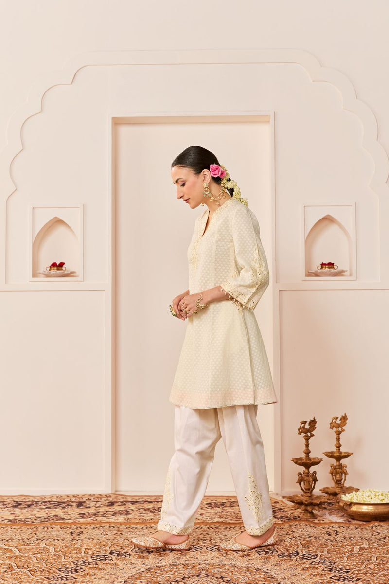 REEM - DAISY IVORY SHORT CHOGA WITH DOGRI SALWAR chanderi silk kurta/kurta set by SHEETAL BATRA in daisy iovry with carnation pink for women Worldwide