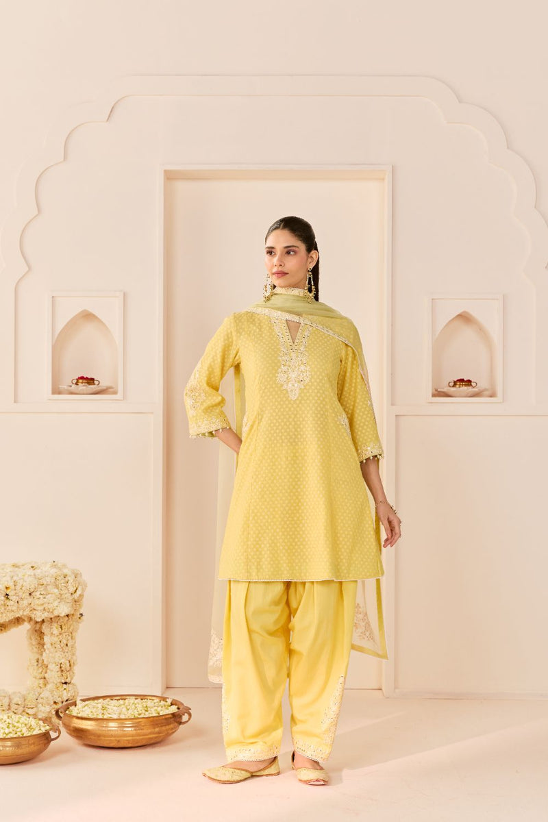REEM - LEMON YELLOW SHORT CHOGA WITH DOGRI SALWAR chanderi silk kurta/kurta set by SHEETAL BATRA in lemon yellow with mint green for women Worldwide