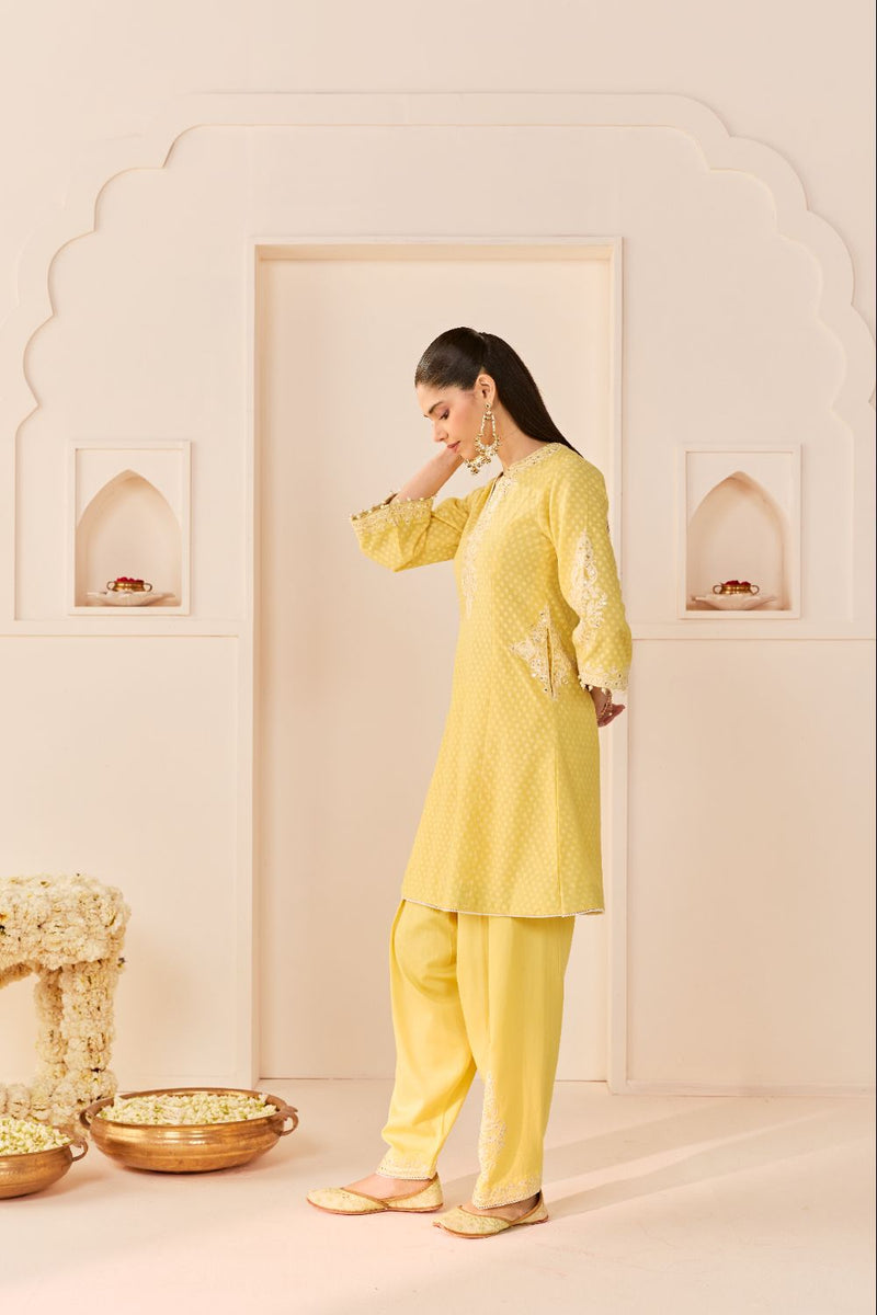 REEM - LEMON YELLOW SHORT CHOGA WITH DOGRI SALWAR chanderi silk kurta/kurta set by SHEETAL BATRA in lemon yellow with mint green for women Worldwide