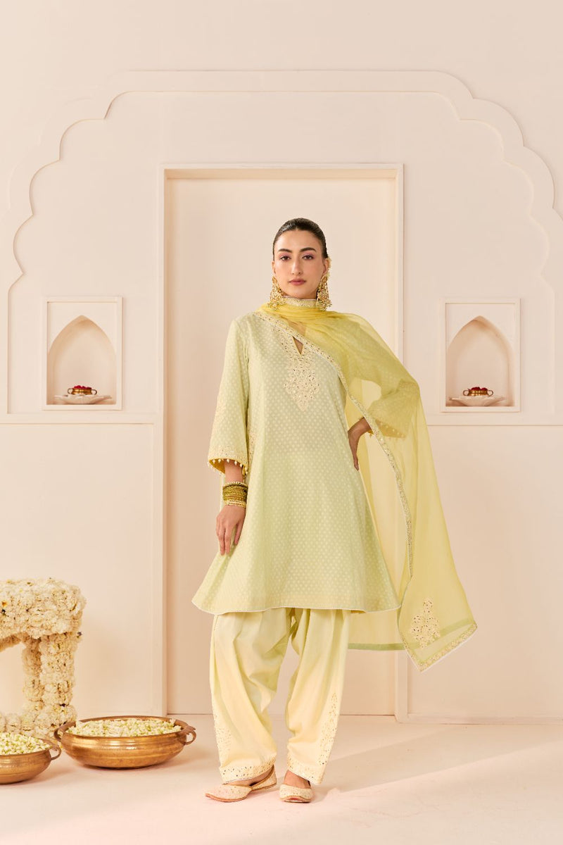 REEM - MINT GREEN SHORT CHOGA WITH DOGRI SALWAR chanderi silk kurta/kurta set by SHEETAL BATRA in mint green with lemon yellow for women Worldwide
