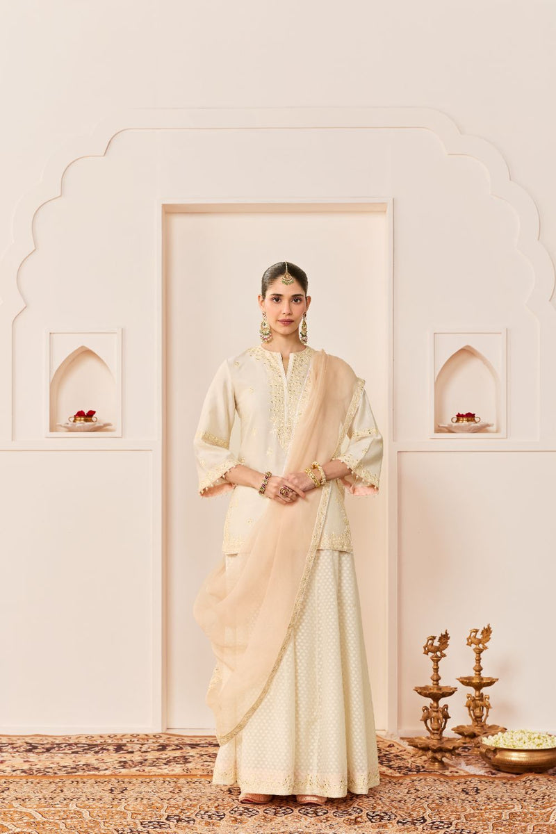 REHMA -DAISY IVORY SHORT KURTA WITH SHARARA AND DUPATTA chanderi silk kurta/kurta set by SHEETAL BATRA in daisy ivory with carnation pink for women Worldwide