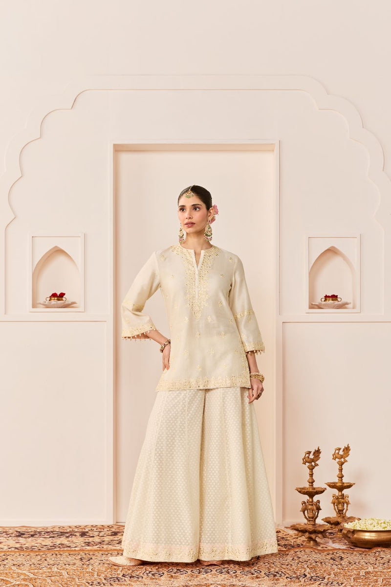 REHMA -DAISY IVORY SHORT KURTA WITH SHARARA AND DUPATTA chanderi silk kurta/kurta set by SHEETAL BATRA in daisy ivory with carnation pink for women Worldwide