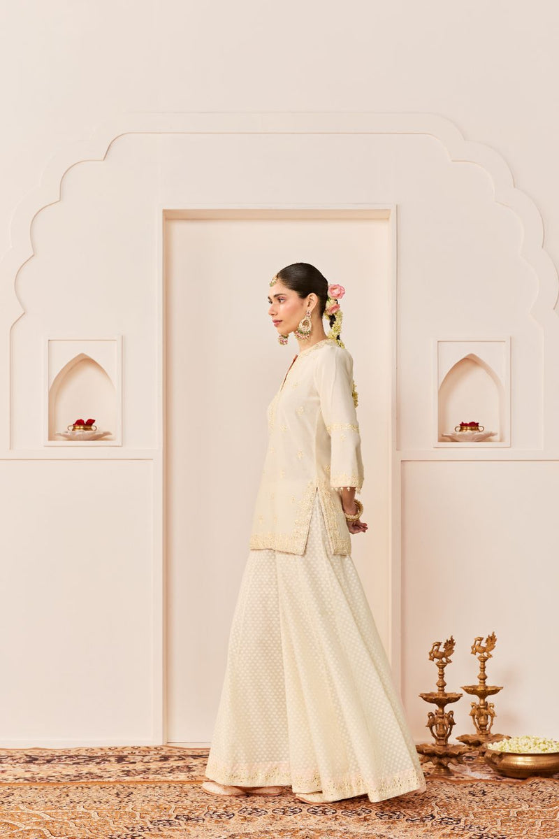 REHMA -DAISY IVORY SHORT KURTA WITH SHARARA AND DUPATTA chanderi silk kurta/kurta set by SHEETAL BATRA in daisy ivory with carnation pink for women Worldwide