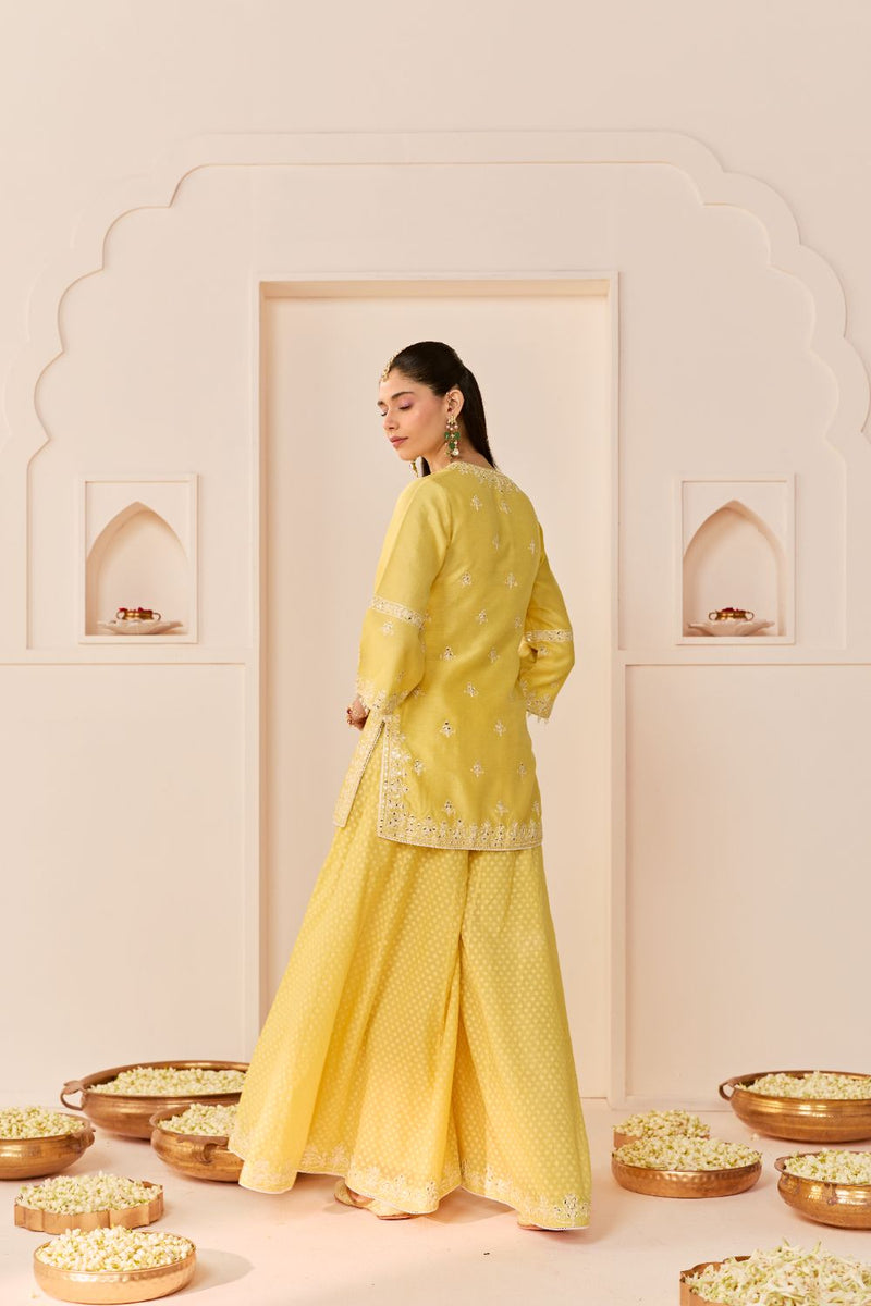 REHMA - LEMON YELLOW SHORT KURTA WITH SHARARA AND DUPATTA chanderi silk kurta/kurta set by SHEETAL BATRA in lemon yellow with mint green for women Worldwide