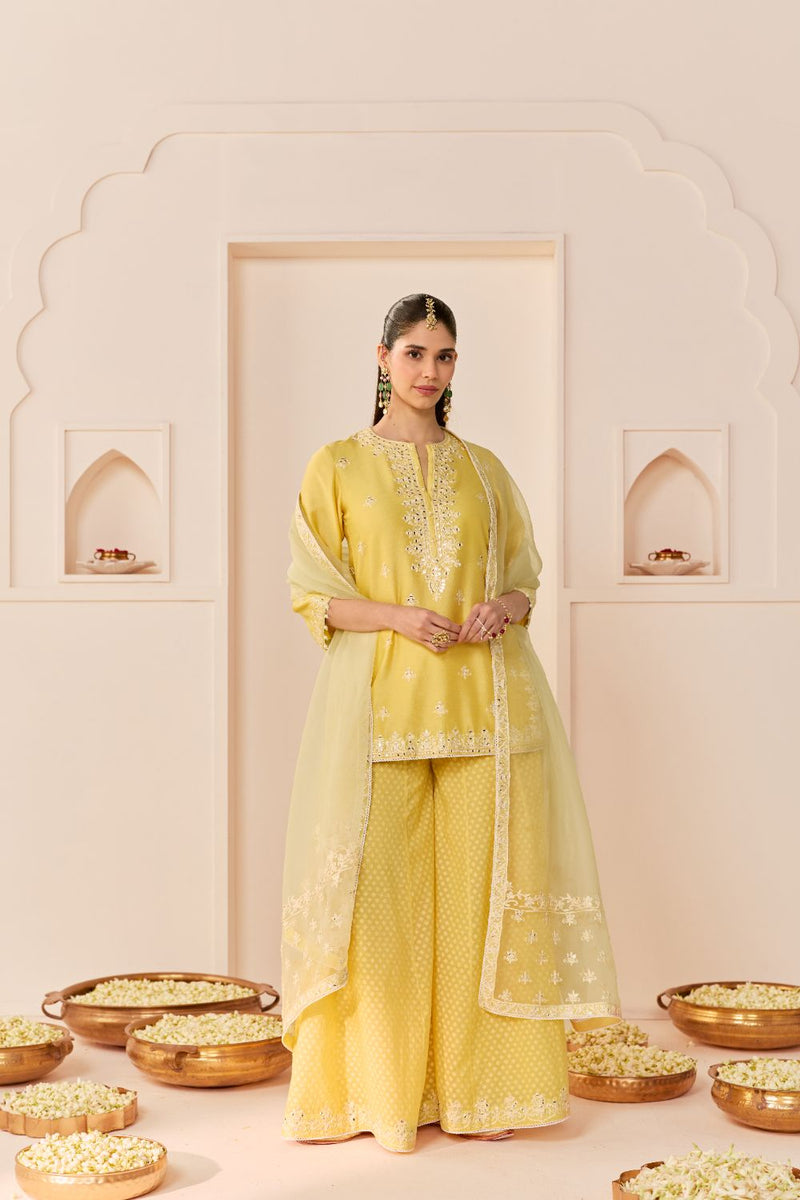 REHMA - LEMON YELLOW SHORT KURTA WITH SHARARA AND DUPATTA chanderi silk kurta/kurta set by SHEETAL BATRA in lemon yellow with mint green for women Worldwide