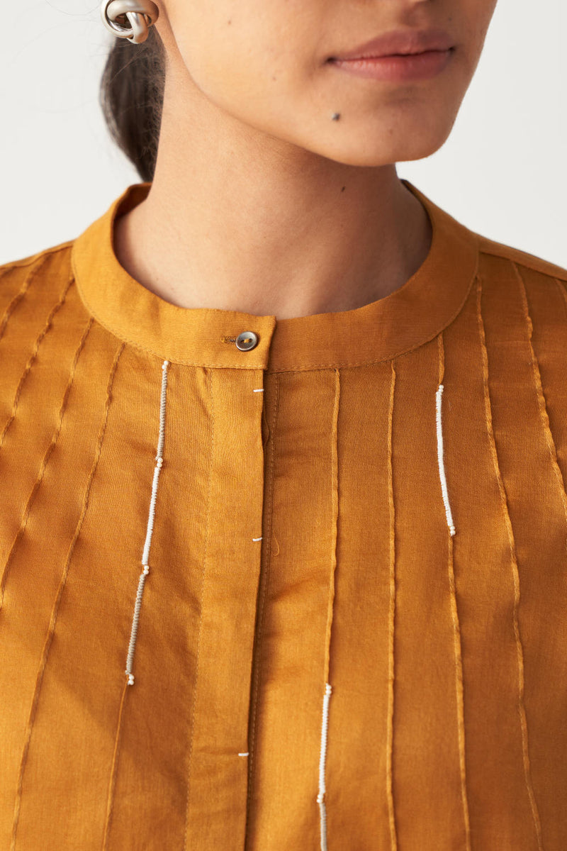 PINTUCK BAT SLEEVE TOP-MUSTARD chanderi by THREE in mustard color for women Worldwide