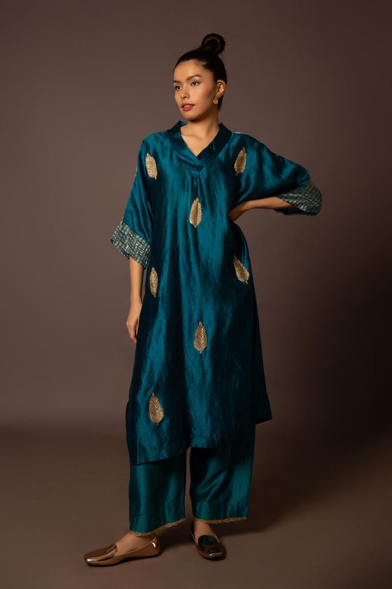 Teal Kaftan kurta with pitta work silk by Myoho in teal color for women Worldwide