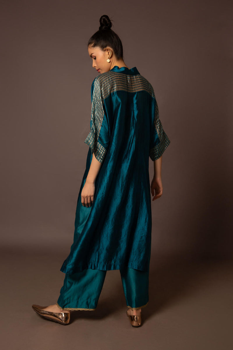 Teal Kaftan kurta with pitta work silk by Myoho in teal color for women Worldwide