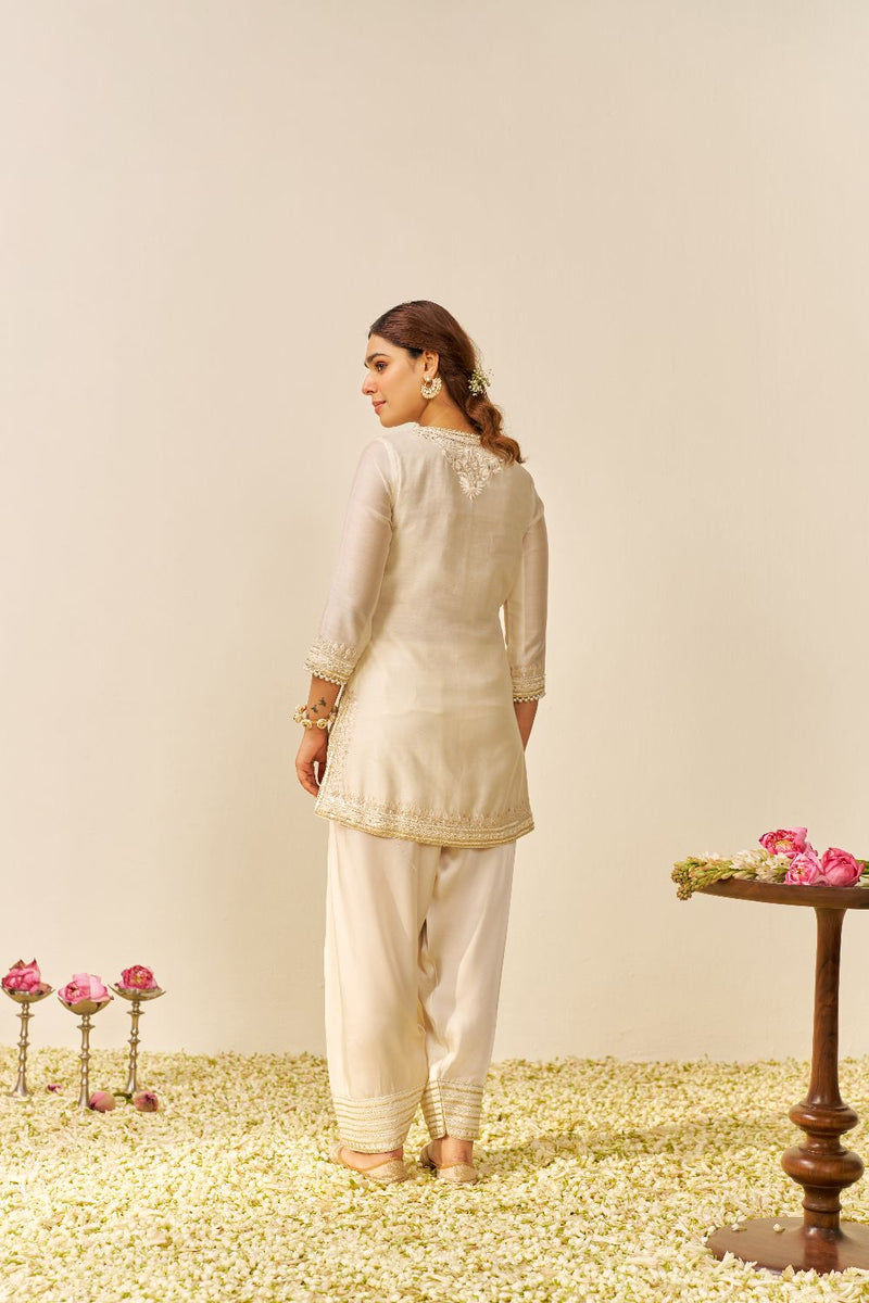 Sara - Short Kurta With Salwar And Dupatta-Daisy Ivory silk by SHEETAL BATRA in ivory color for women Worldwide