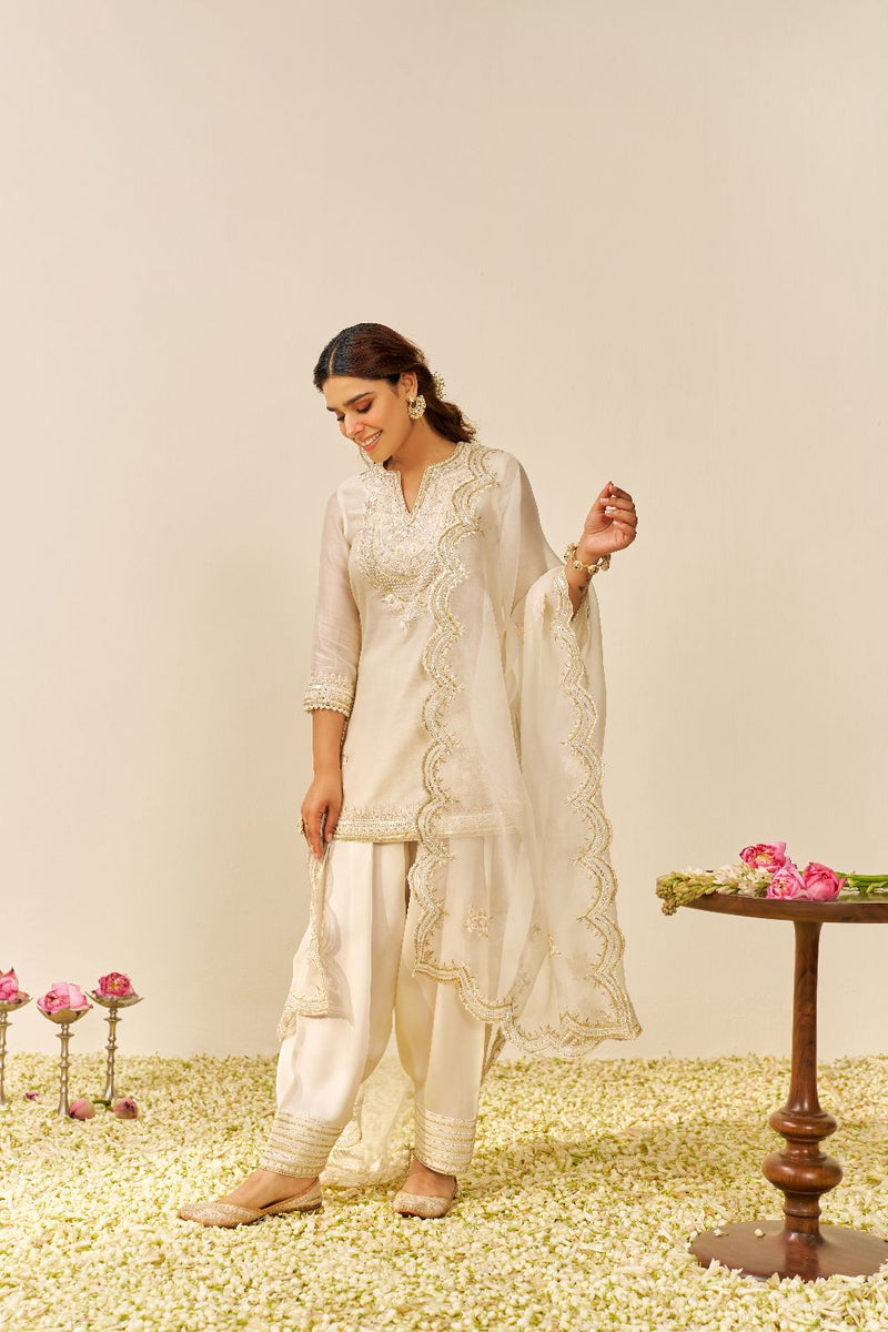 Sara - Short Kurta With Salwar And Dupatta-Daisy Ivory silk by SHEETAL BATRA in ivory color for women Worldwide