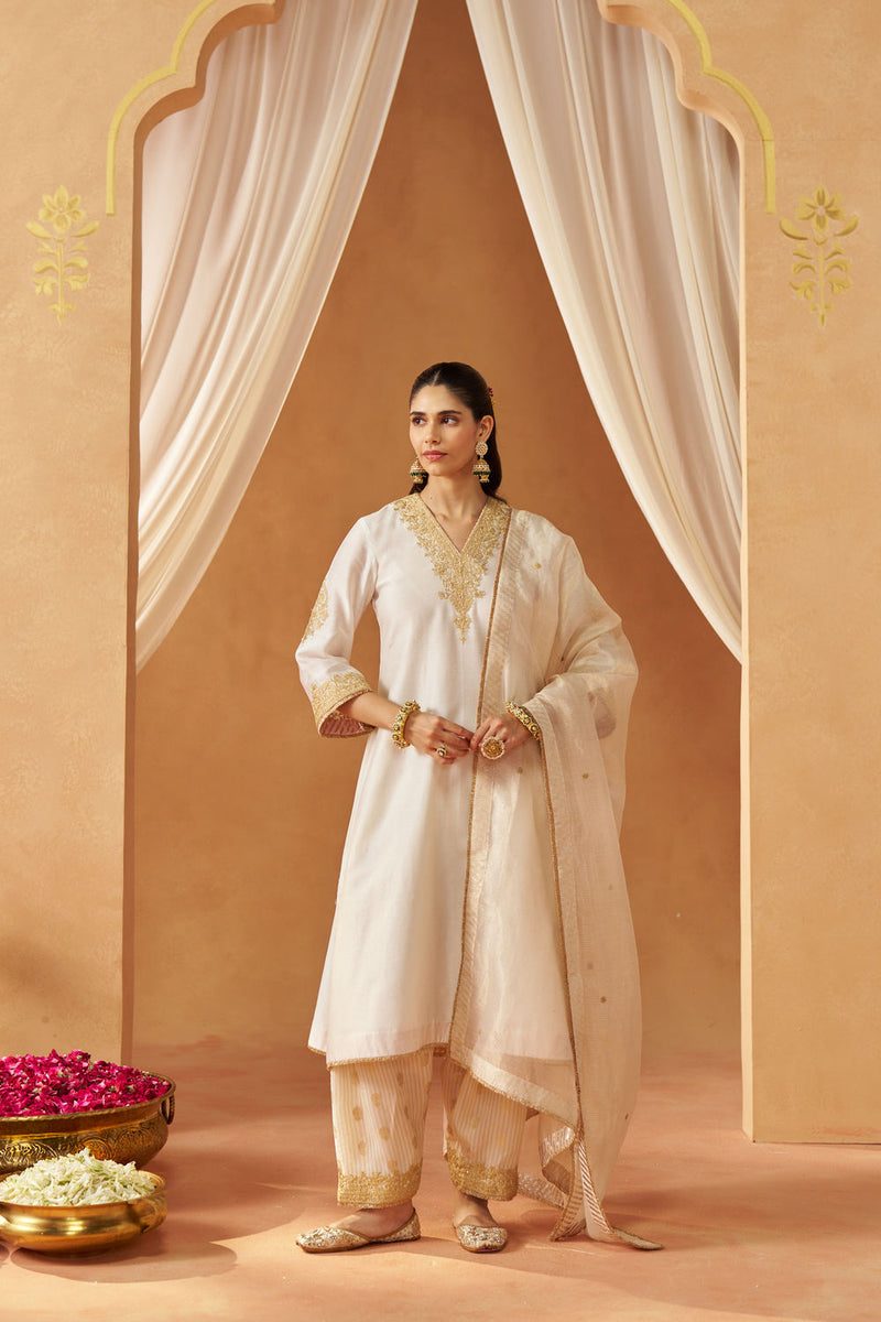 Liana Daisy ivory Chauga with Salwar and Dupatta silk chanderi kurta/kurta set by SHEETAL BATRA in ivory for women Worldwide