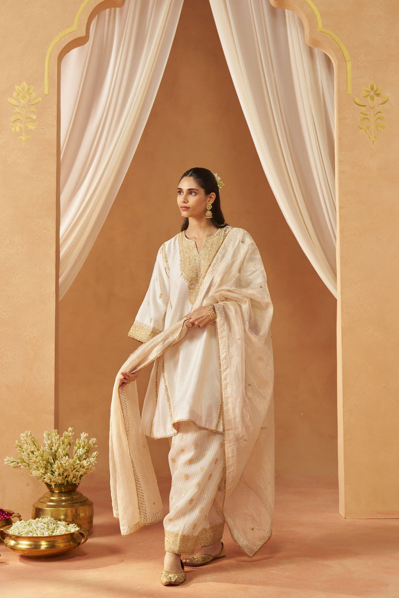 Maahgul Daisy Ivory Kalidaar Chauga with Salwar and Dupatta silk chanderi kurta/kurta set by SHEETAL BATRA in ivory for women Worldwide