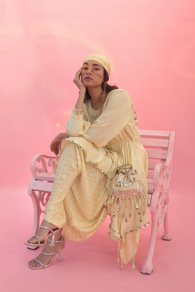 Sakura Yellow Potli Bag satin by PRAHNAAYA in yellow color for women Worldwide