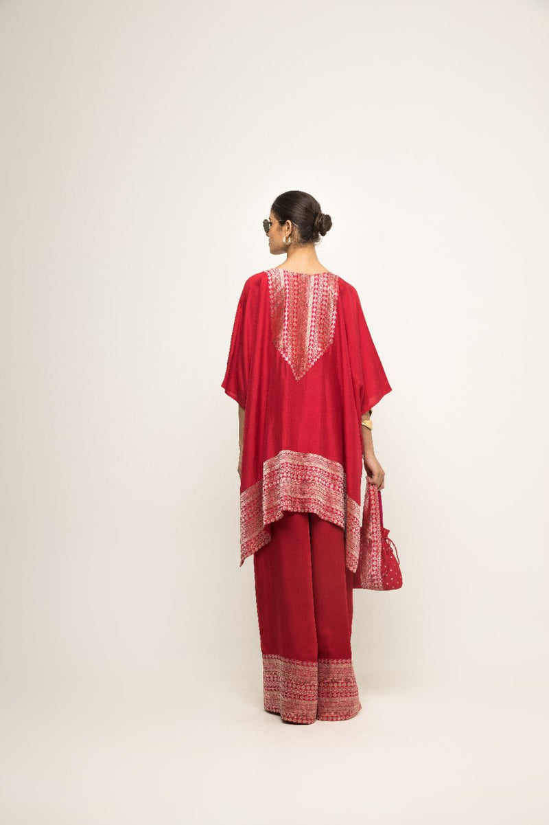 Triya-Asymmetrical Banarasi Silk Kurta & Pants Set - Red silk by SOBARIKO in red color for women Worldwide
