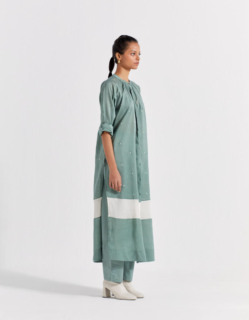 PANEL GATHER NECK SHIRT - JADE POLKA chanderi by THREE in mint color for women Worldwide