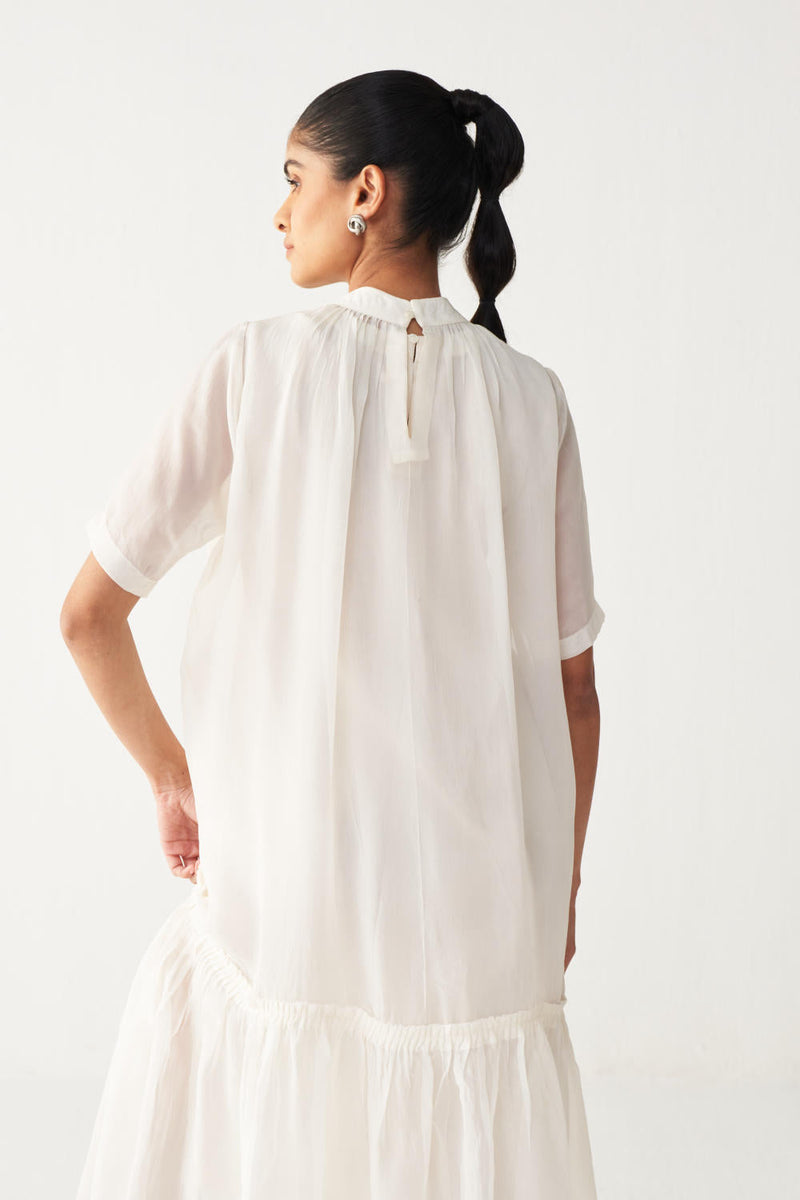 SHEER BOTTOM FRILL DRESS +
IVORY CHANDERI SLIP-IVORY organza by THREE in white color for women Worldwide