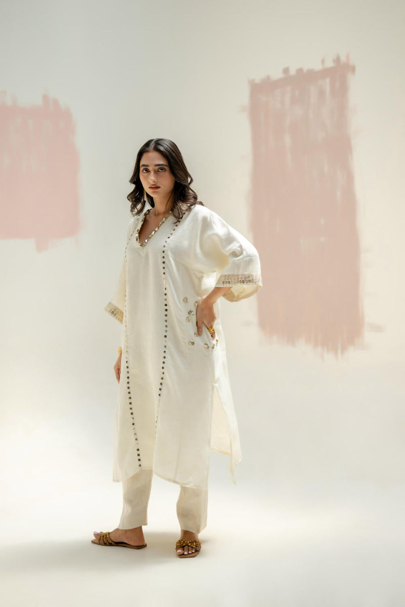 Aaram Choga Kurta with Pants-White linen by PRAHNAAYA in white color for women Worldwide