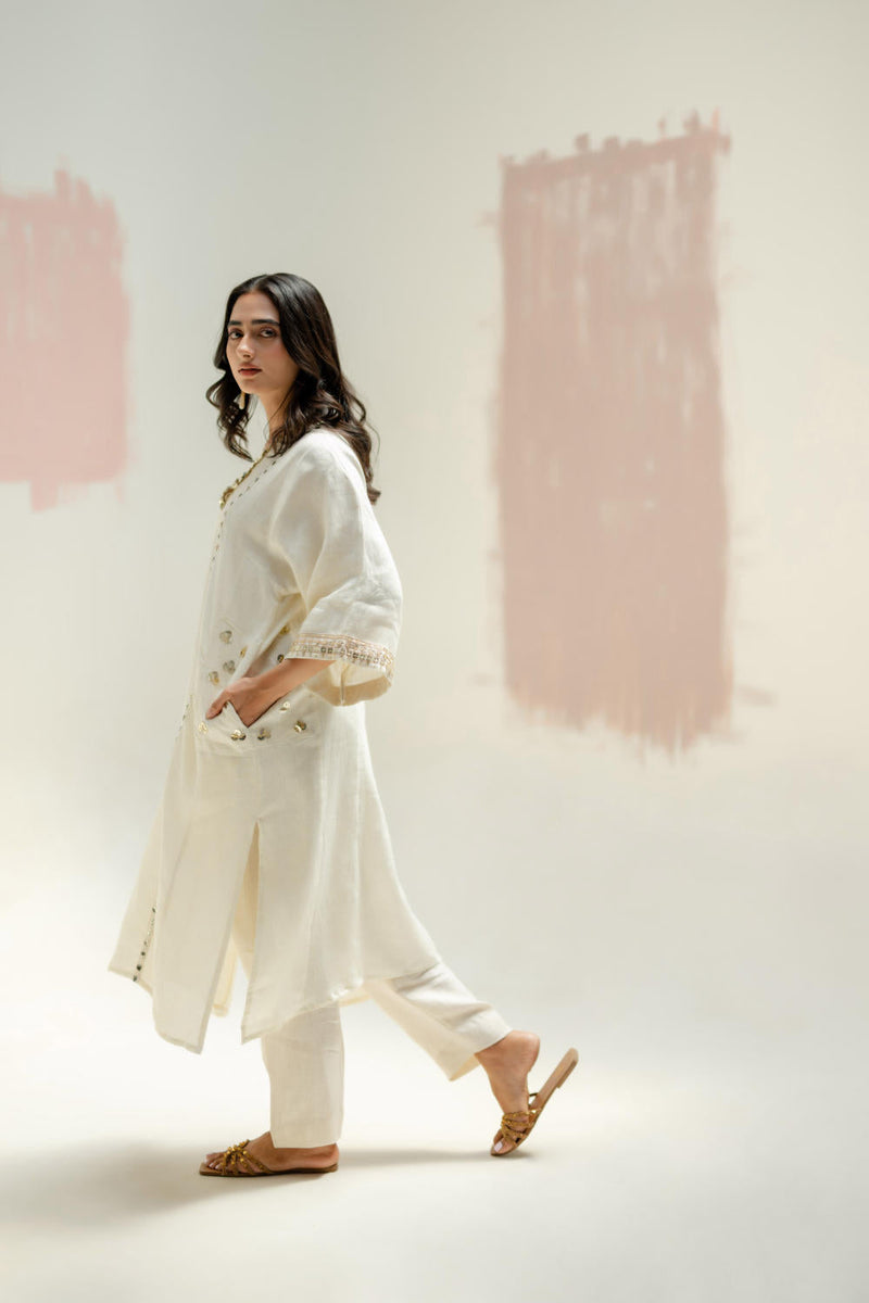 Aaram Choga Kurta with Pants-White linen by PRAHNAAYA in white color for women Worldwide