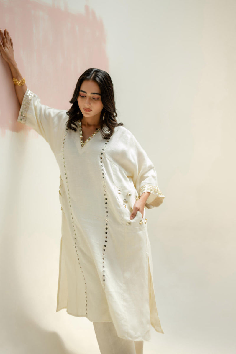 Aaram Choga Kurta with Pants-White linen by PRAHNAAYA in white color for women Worldwide