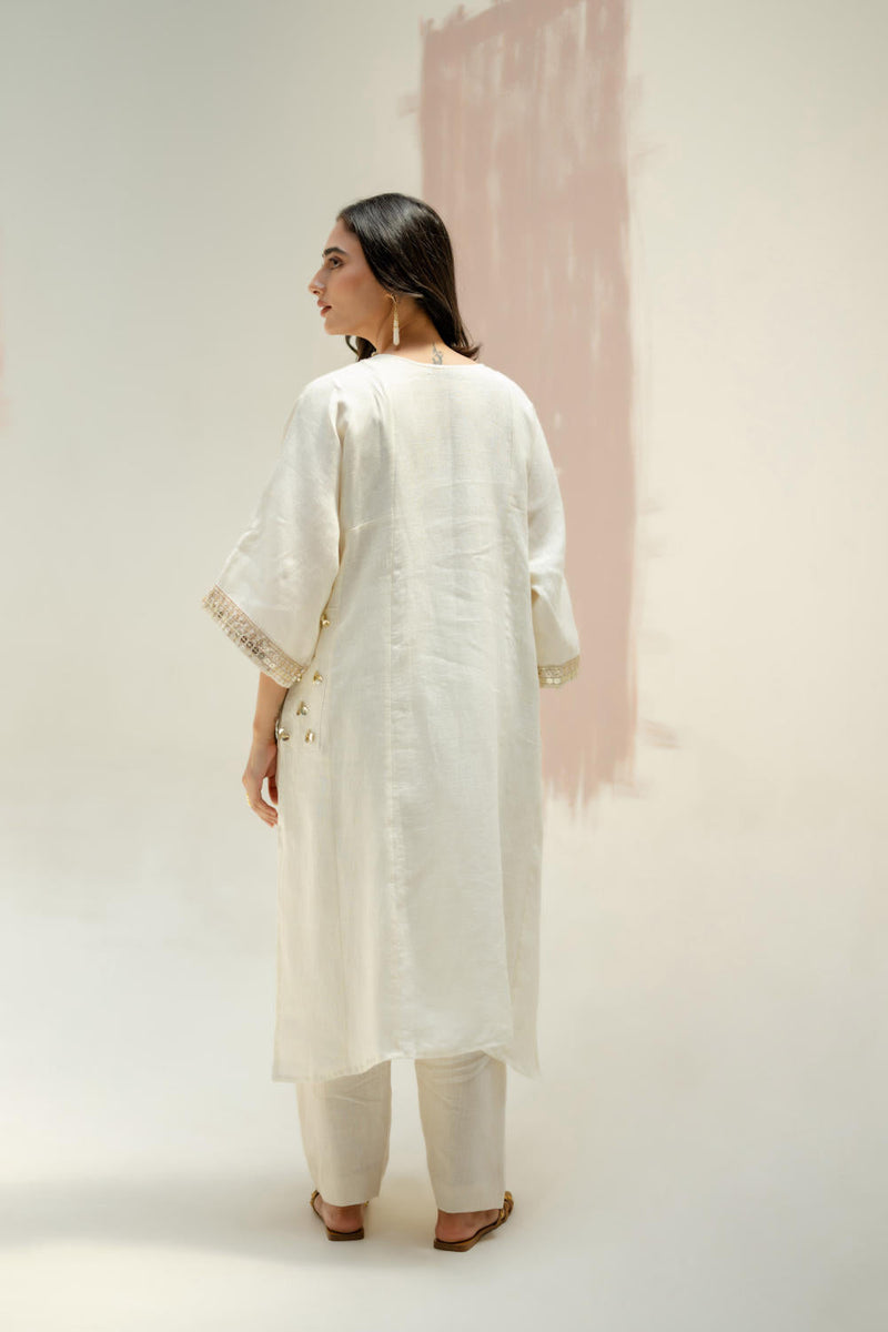 Aaram Choga Kurta with Pants-White linen by PRAHNAAYA in white color for women Worldwide