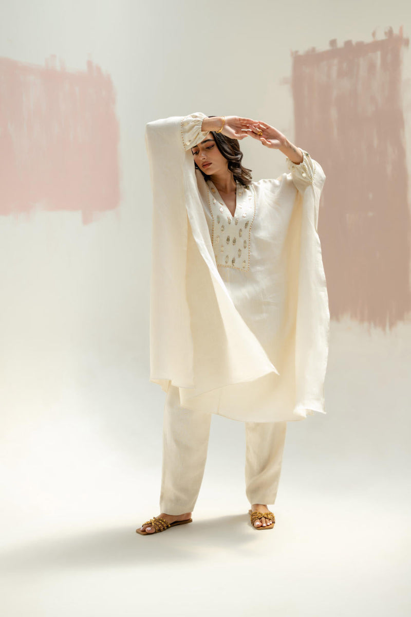 Preetie in Moroccan Kaftan with Pants-White linen by PRAHNAAYA in white color for women Worldwide
