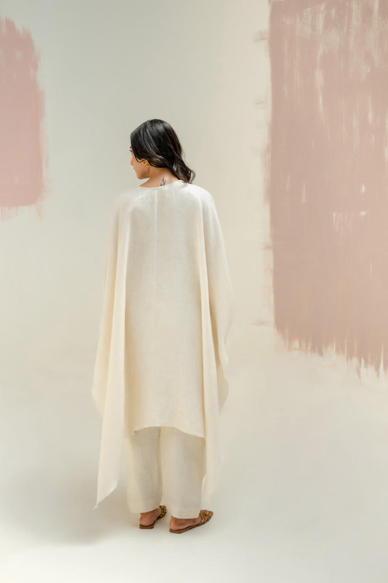 Preetie in Moroccan Kaftan with Pants-White linen by PRAHNAAYA in white color for women Worldwide