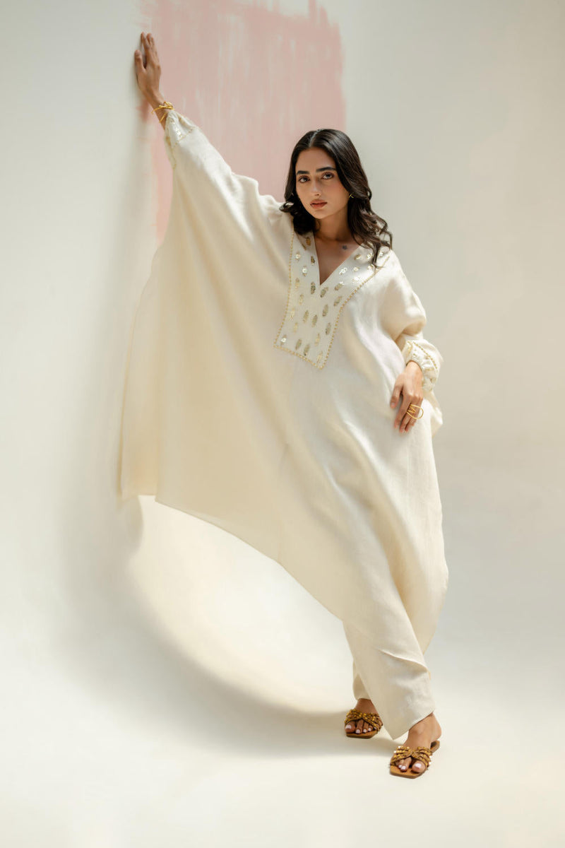 Preetie in Moroccan Kaftan with Pants-White linen by PRAHNAAYA in white color for women Worldwide