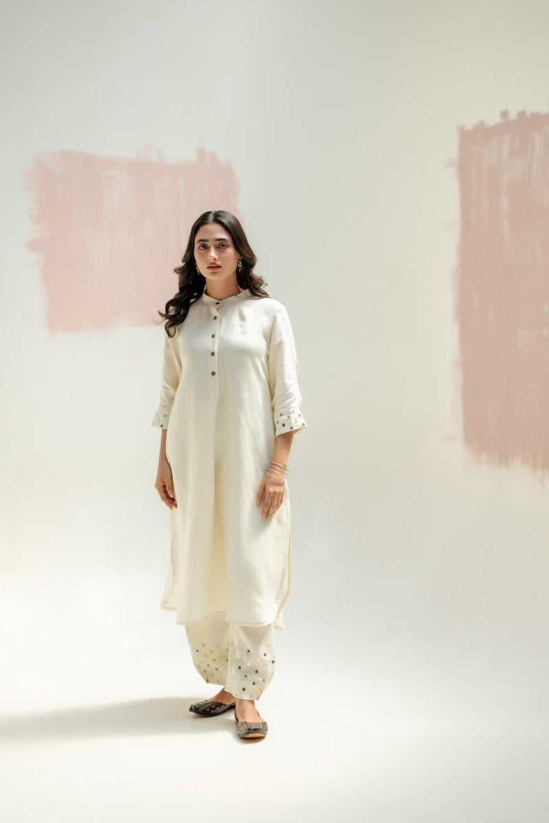 Mia Slim Kurta and Hand embroidered Pants-White linen by PRAHNAAYA in white color for women Worldwide