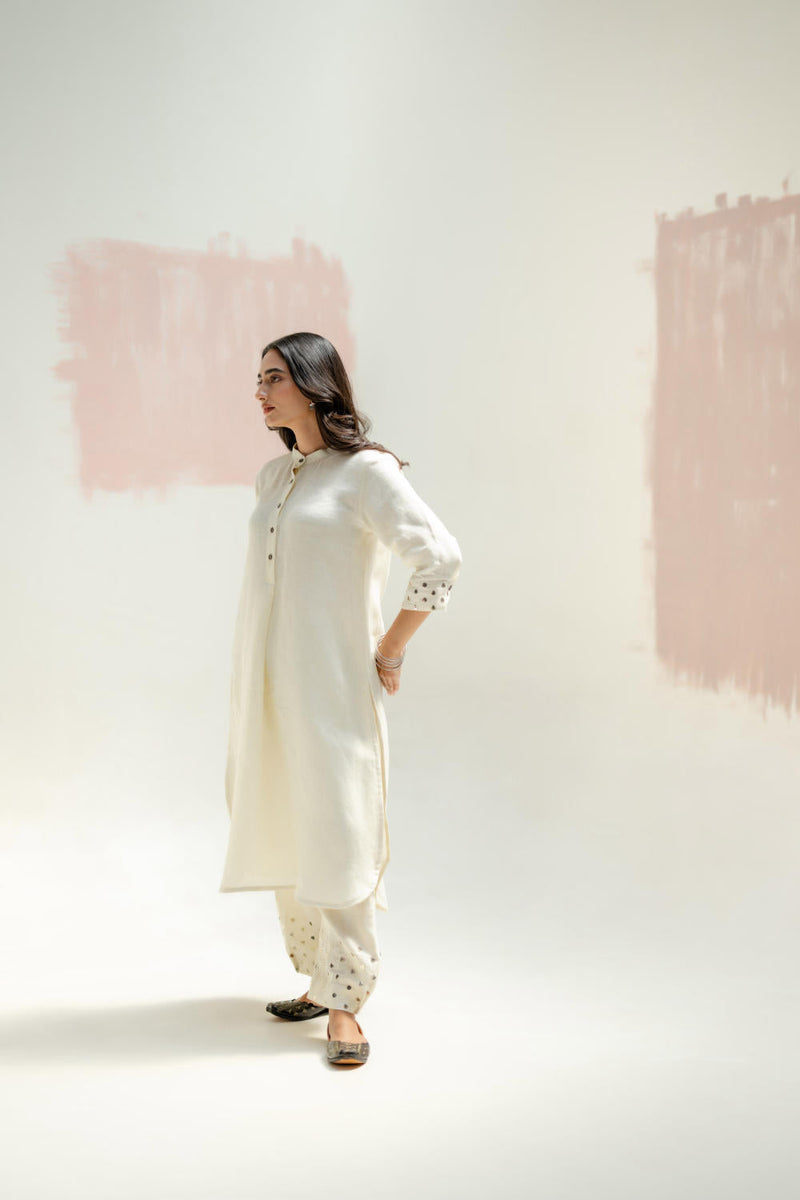 Mia Slim Kurta and Hand embroidered Pants-White linen by PRAHNAAYA in white color for women Worldwide