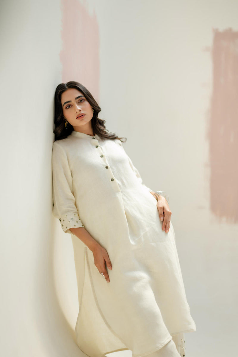 Mia Slim Kurta and Hand embroidered Pants-White linen by PRAHNAAYA in white color for women Worldwide