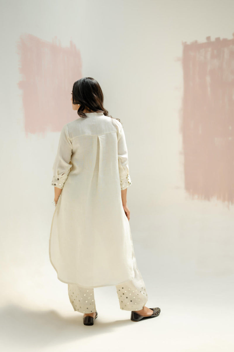 Mia Slim Kurta and Hand embroidered Pants-White linen by PRAHNAAYA in white color for women Worldwide