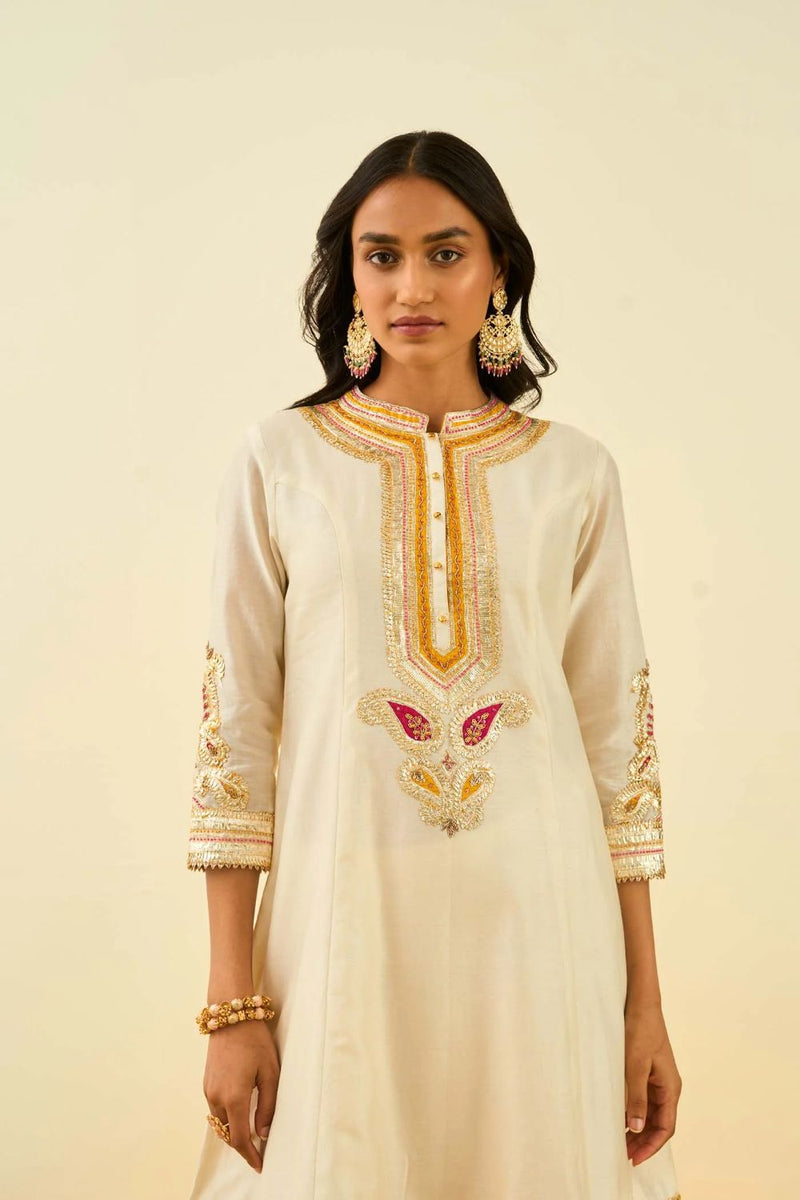 Sadirah Short Kurta with Salwar and Dupatta-Daisy ivory silk by SHEETAL BATRA in ivory color for women Worldwide