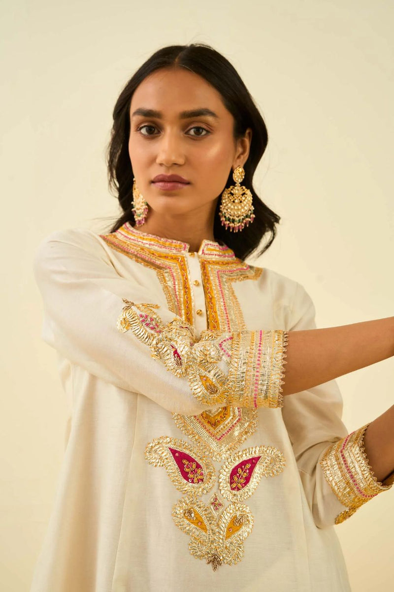 Sadirah Short Kurta with Salwar and Dupatta-Daisy ivory silk by SHEETAL BATRA in ivory color for women Worldwide