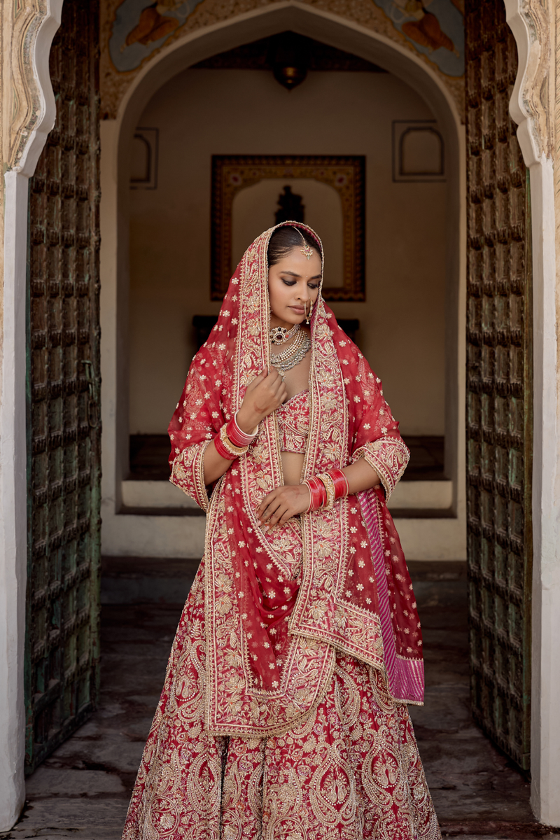 Sanaa - Dabka Zardozi Embroidered Raw Silk Red Bridal Lehenga Set silk by SHEETAL BATRA in red color for women Worldwide