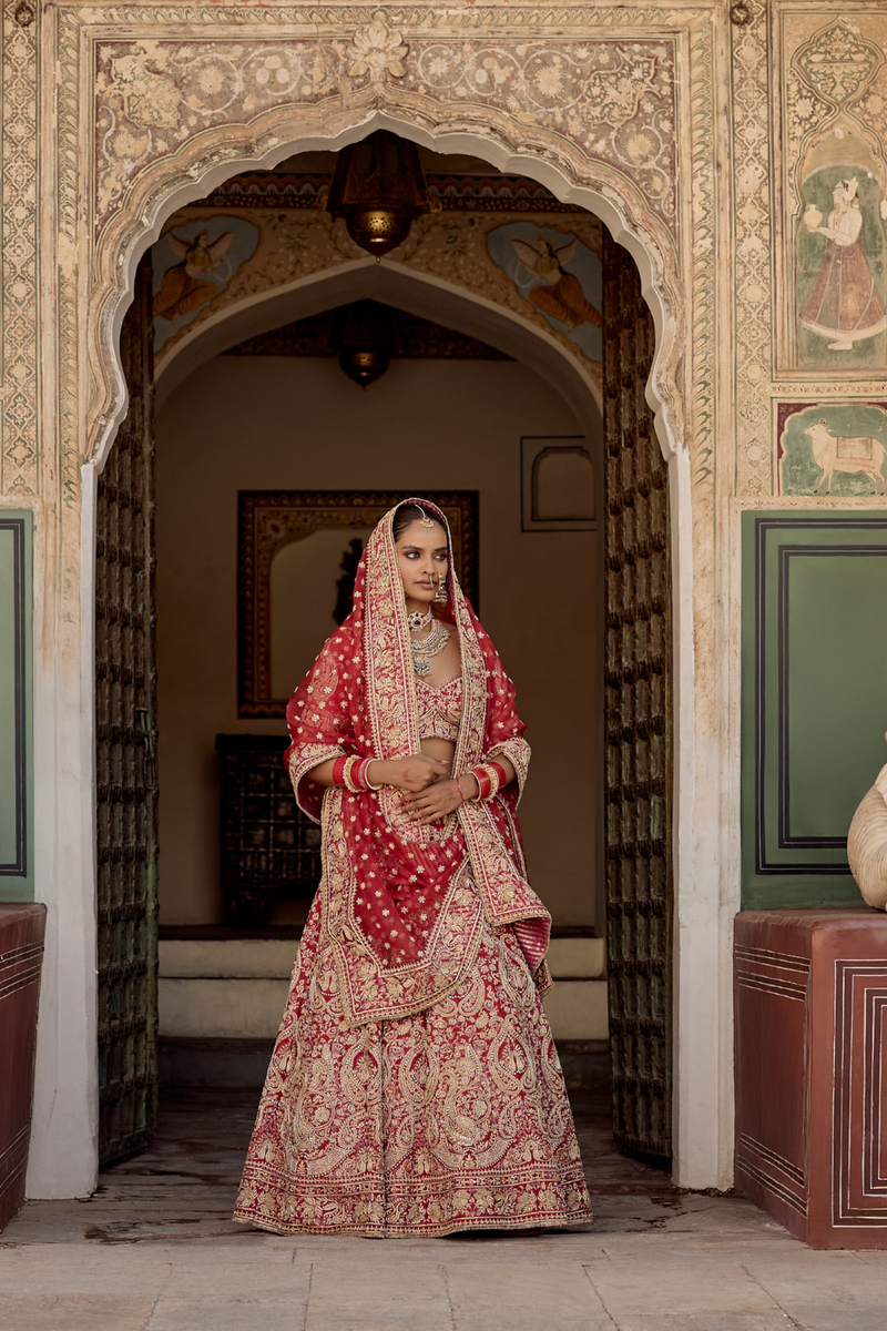 Sanaa - Dabka Zardozi Embroidered Raw Silk Red Bridal Lehenga Set silk by SHEETAL BATRA in red color for women Worldwide