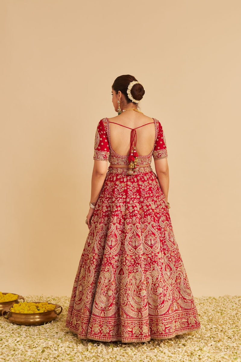 Sanaa - Dabka Zardozi Embroidered Raw Silk Red Bridal Lehenga Set silk by SHEETAL BATRA in red color for women Worldwide
