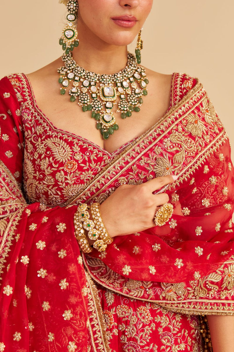 Sanaa - Dabka Zardozi Embroidered Raw Silk Red Bridal Lehenga Set silk by SHEETAL BATRA in red color for women Worldwide
